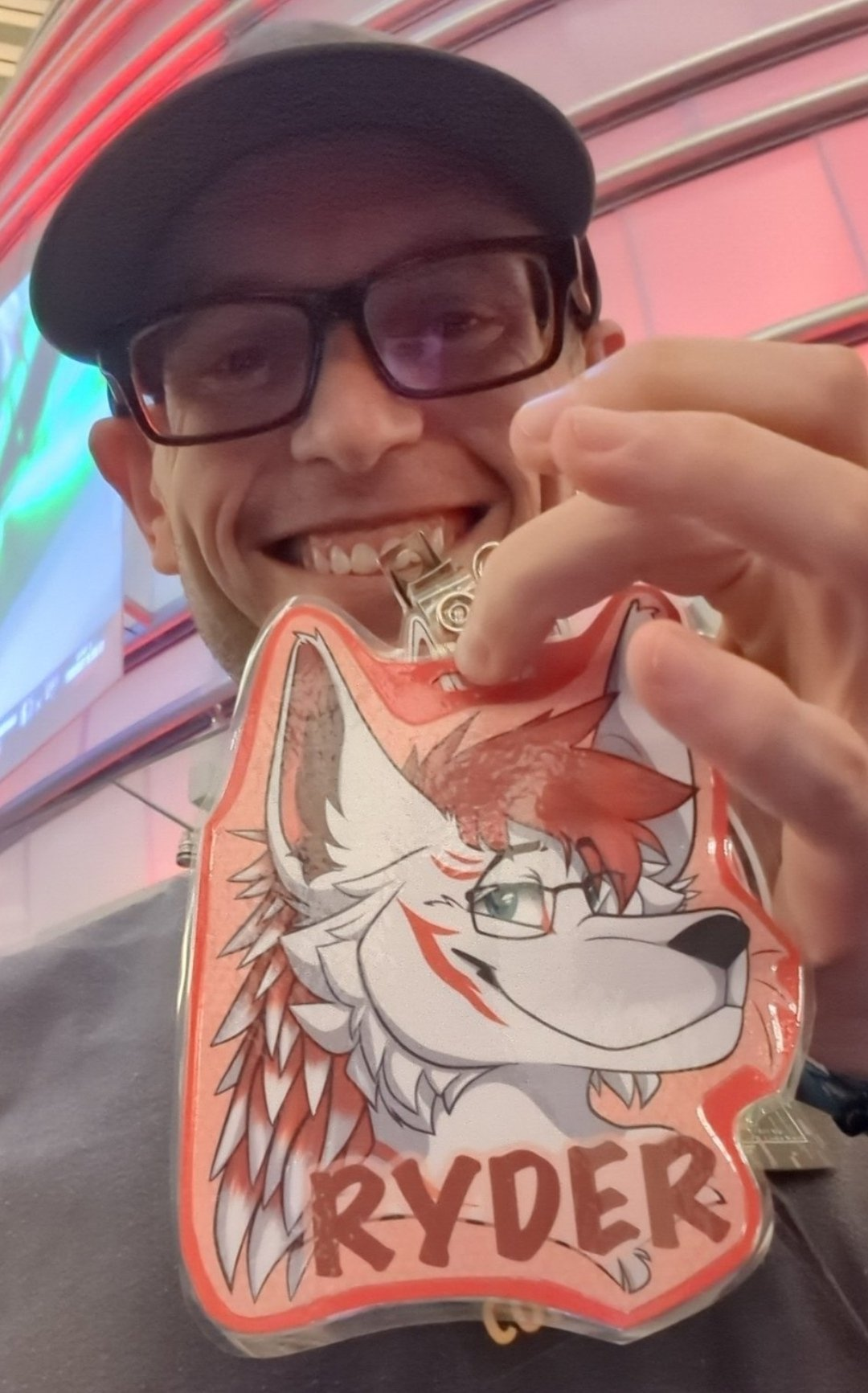 Joseph Ray Robertson holding Ryder badge